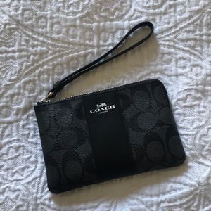 Never used Coach wristlet (no tags )
